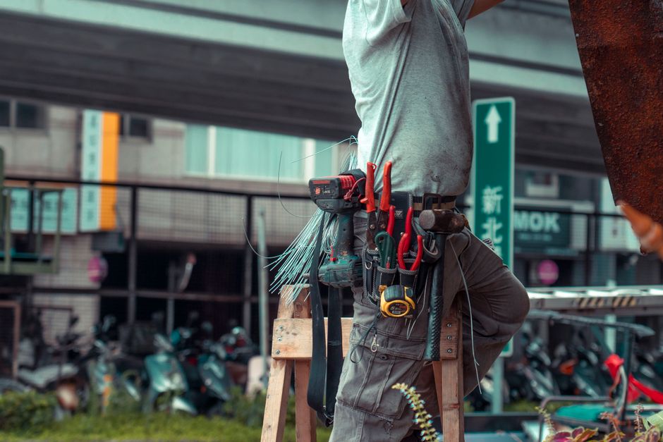 Handyman tools laid out on a work surface