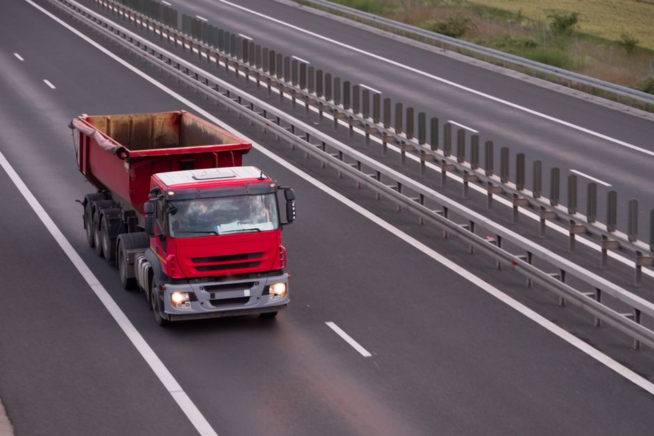 Dump truck loaded with hauled debris